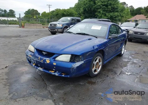 1997 Ford Mustang из США, поврежденный, VIN 1FALP4048VF107519